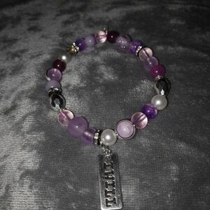 Purple Beaded Bracelet with Silver Charm